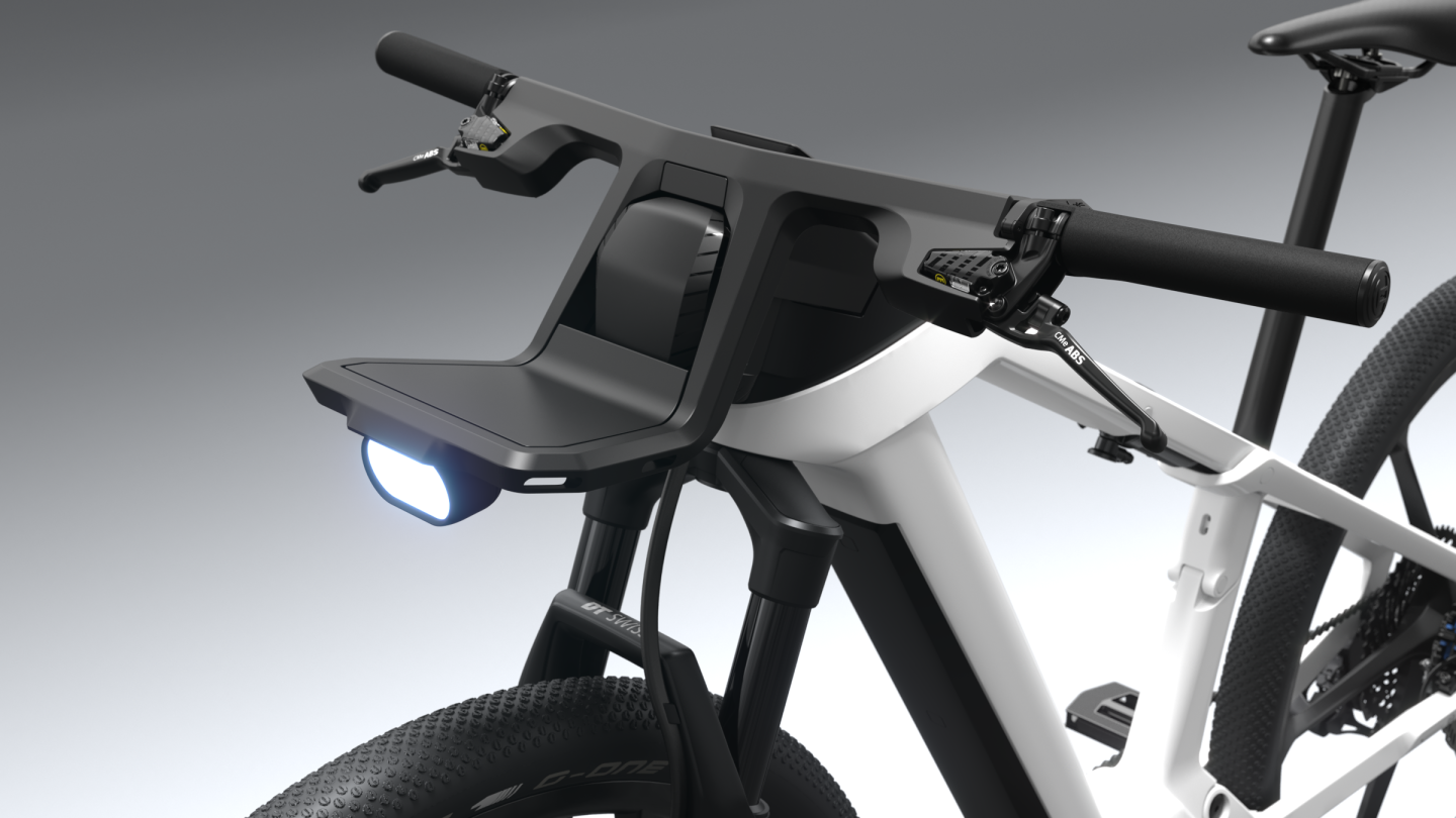 The front cargo rack and headlight sit in front of the eBike ABS module
