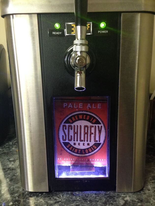 The SYNEK dispenser includes a window for displaying the beer on tap
