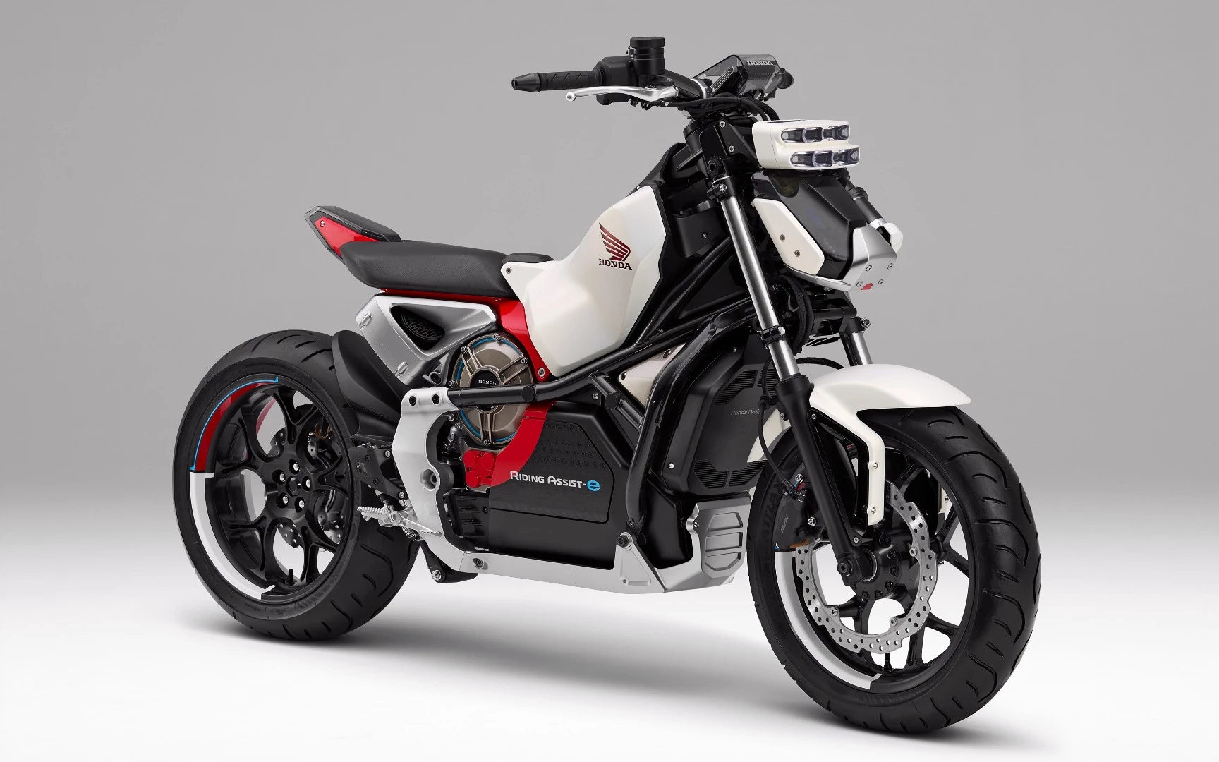 We're presuming that's the gyroscopic self-balancing device located below the seat and hence between the rider's thighs.