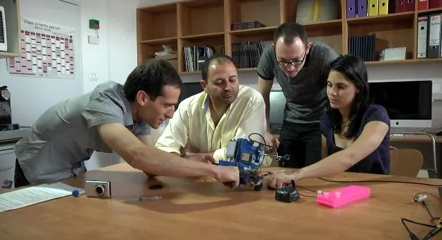 Some of the research team, with the SAGIV prototype