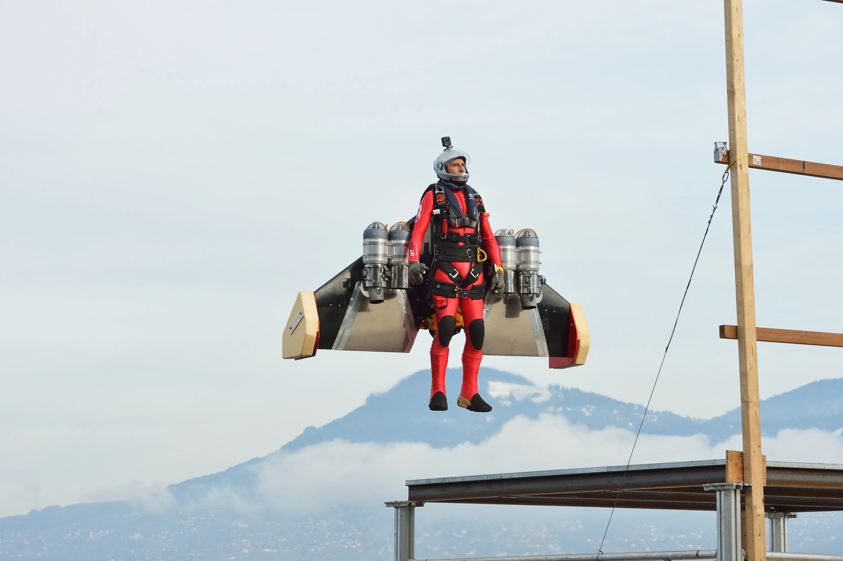 A serene sight, as Jetman Yves Rossy rises up from the ground with his new autonomous VTOL system