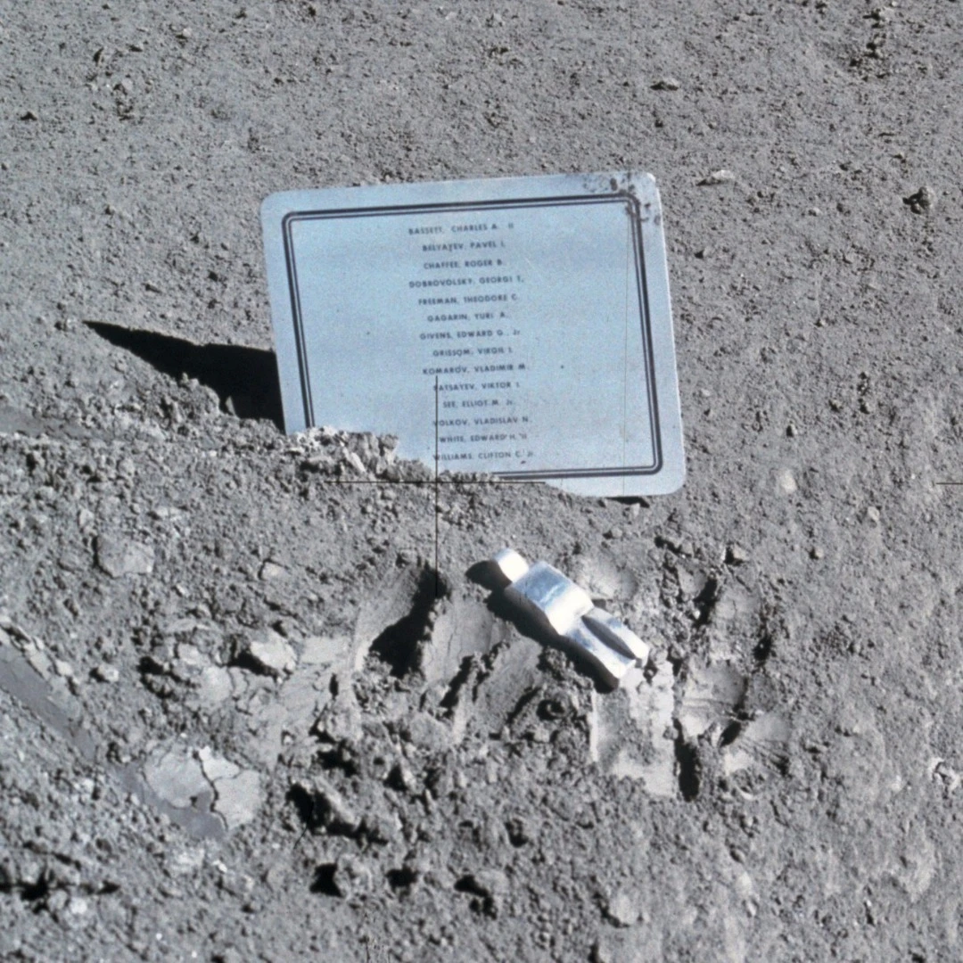 Photo of the Fallen Astronaut and accompanying name plaque left on the moon during the Apollo 15 mission