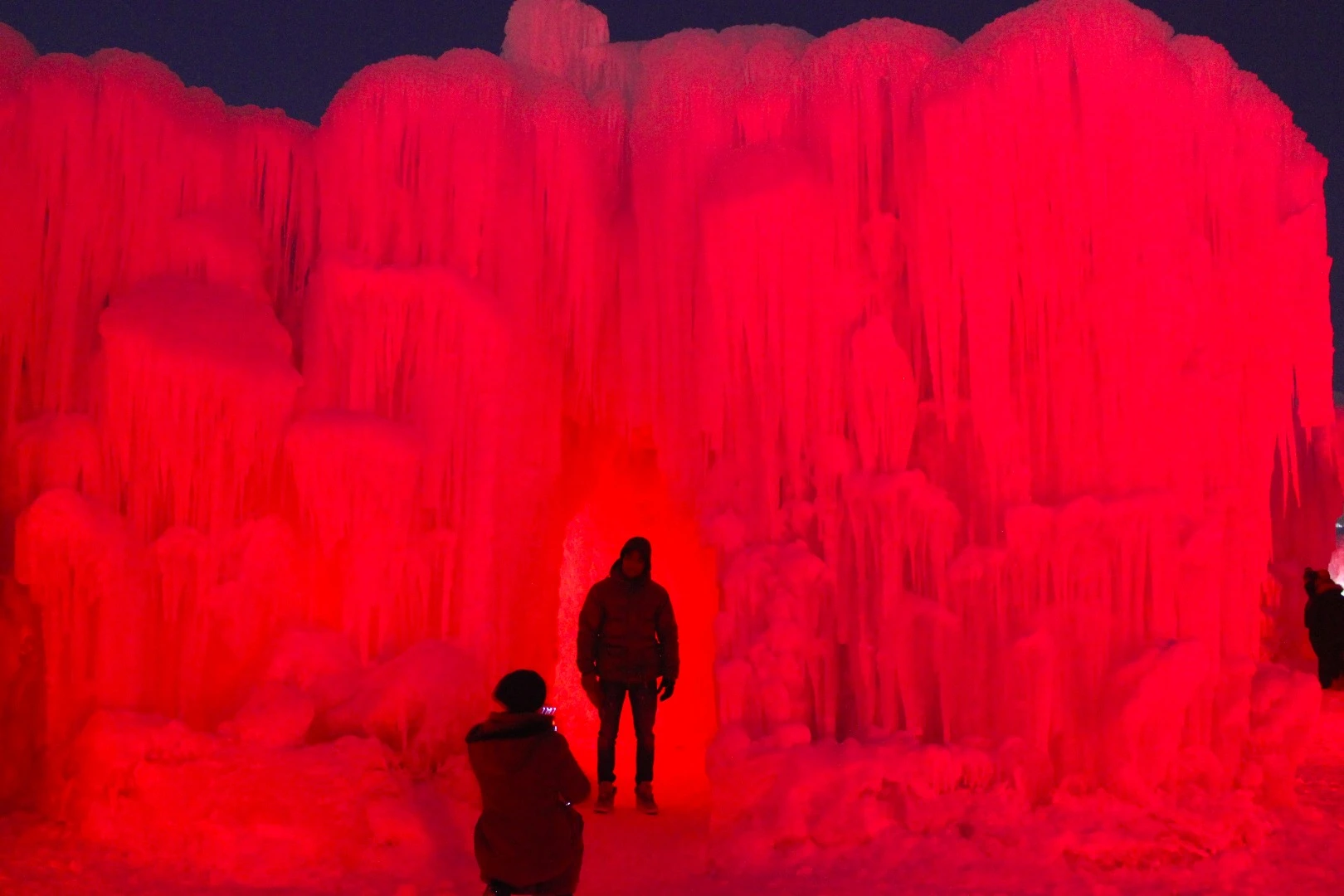 A series of LEDs within the towers light up, changing color in time with a musical soundtrack