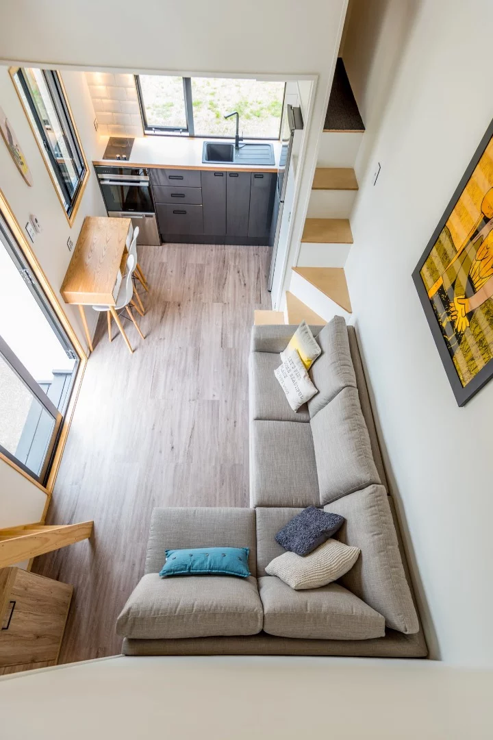 The Pohutukawa home boasts an overall interior space of 33 sqm (355 sq ft), including the two mezzanine lofts