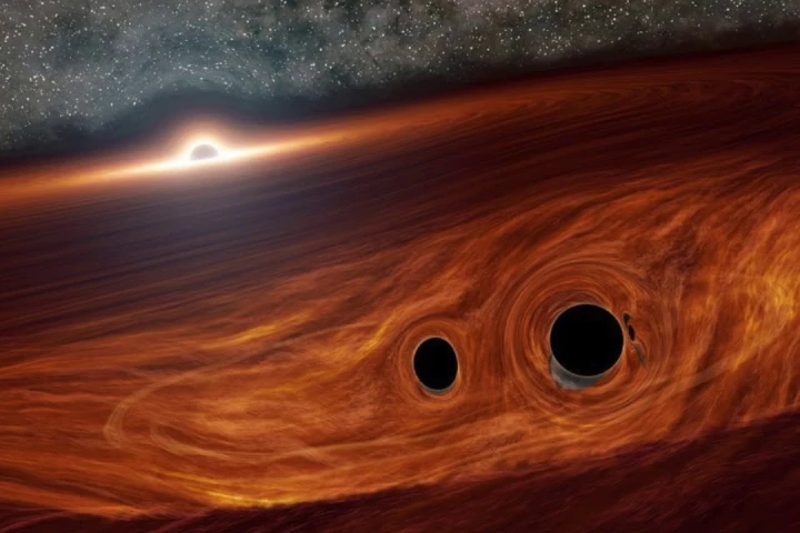 An artist's imagining of the two black holes about to merge, located inside the debris disk of a supermassive black hole