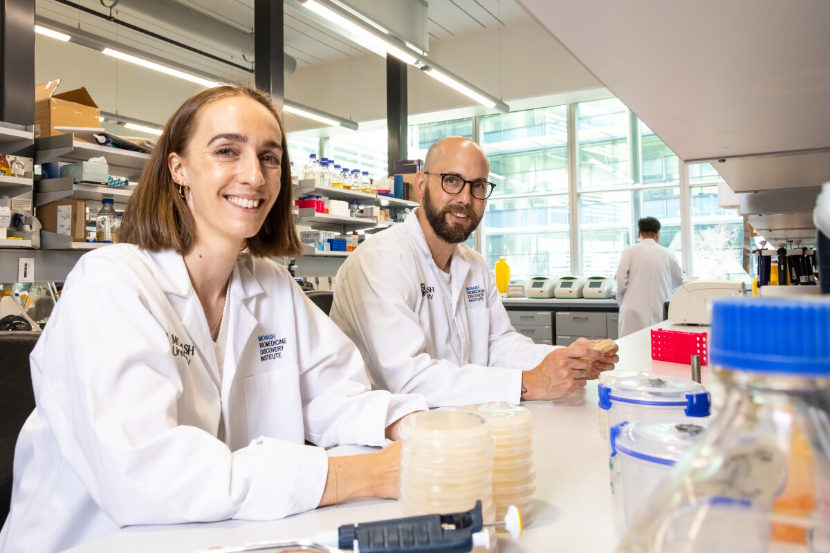 Years of research pays off for PhD student Ashleigh Kropp (left) and Rhys Grinter