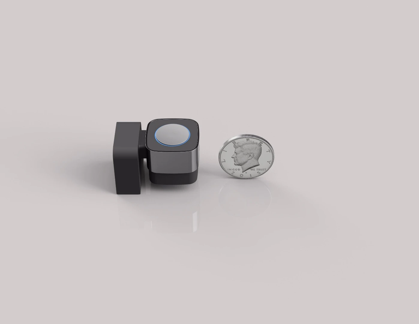 The Microbot Push compared to a US 50-cent piece