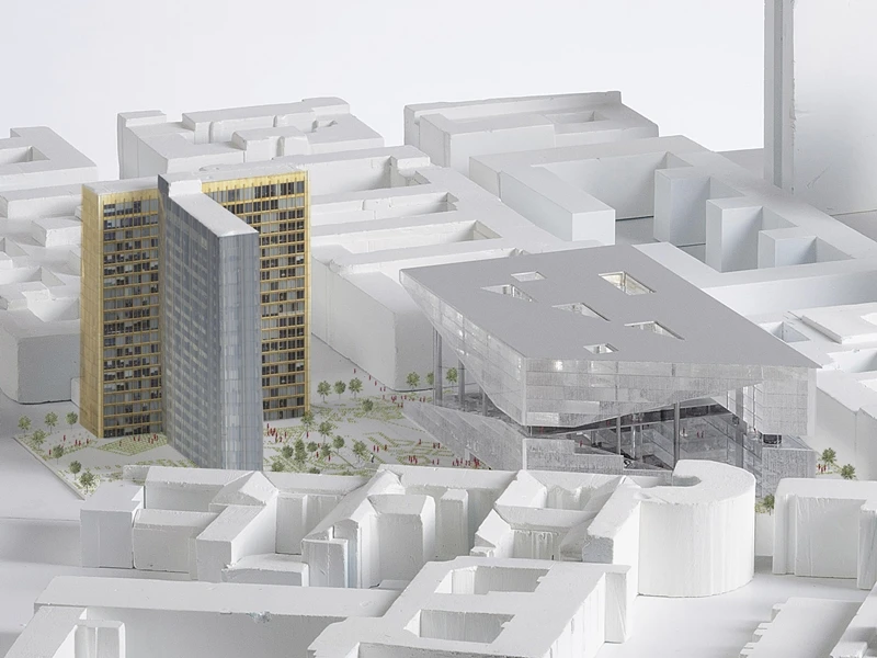 The building will sit with the former path of the Berlin Wall running through it (Image: OMA)