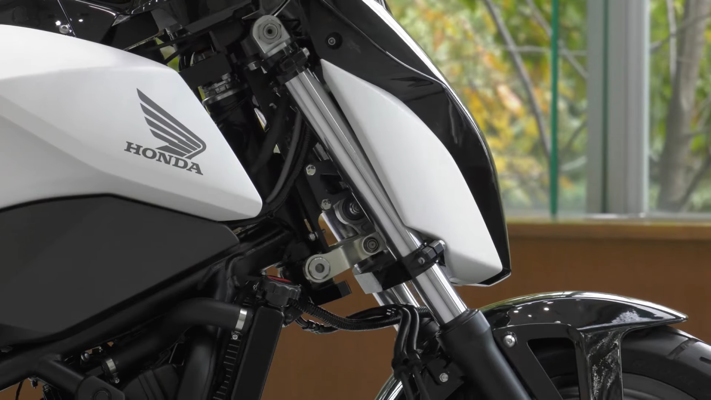Honda's self-balancing motorcycle: offset on the lower triple clamp allows you to change the angle of the forks