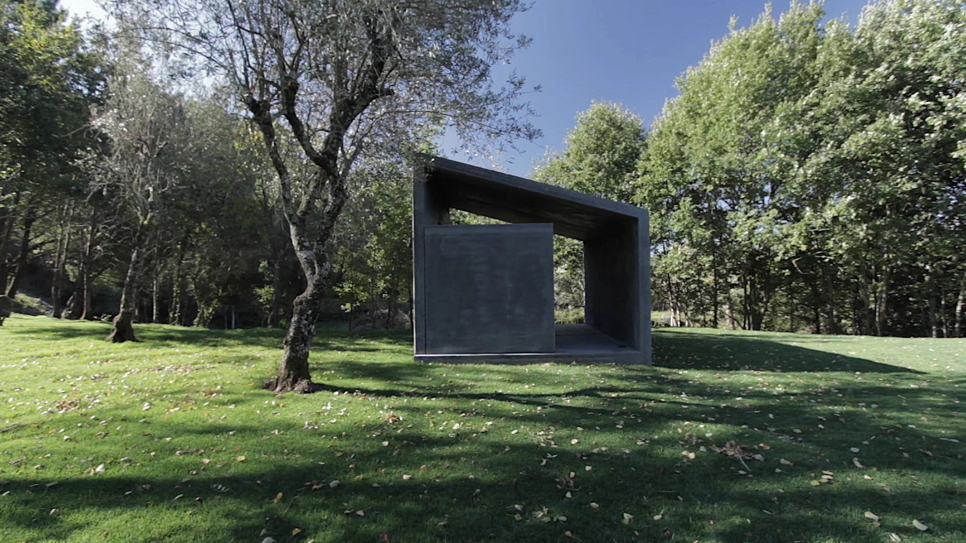 A smaller concrete Gomos acts as a cute garden house