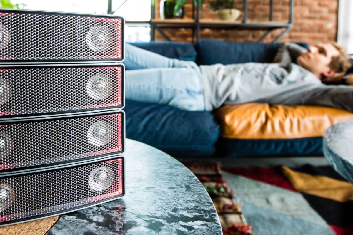 Ai-2 portable speaker units wirelessly connect to each other using optical communication tech and some AI smarts