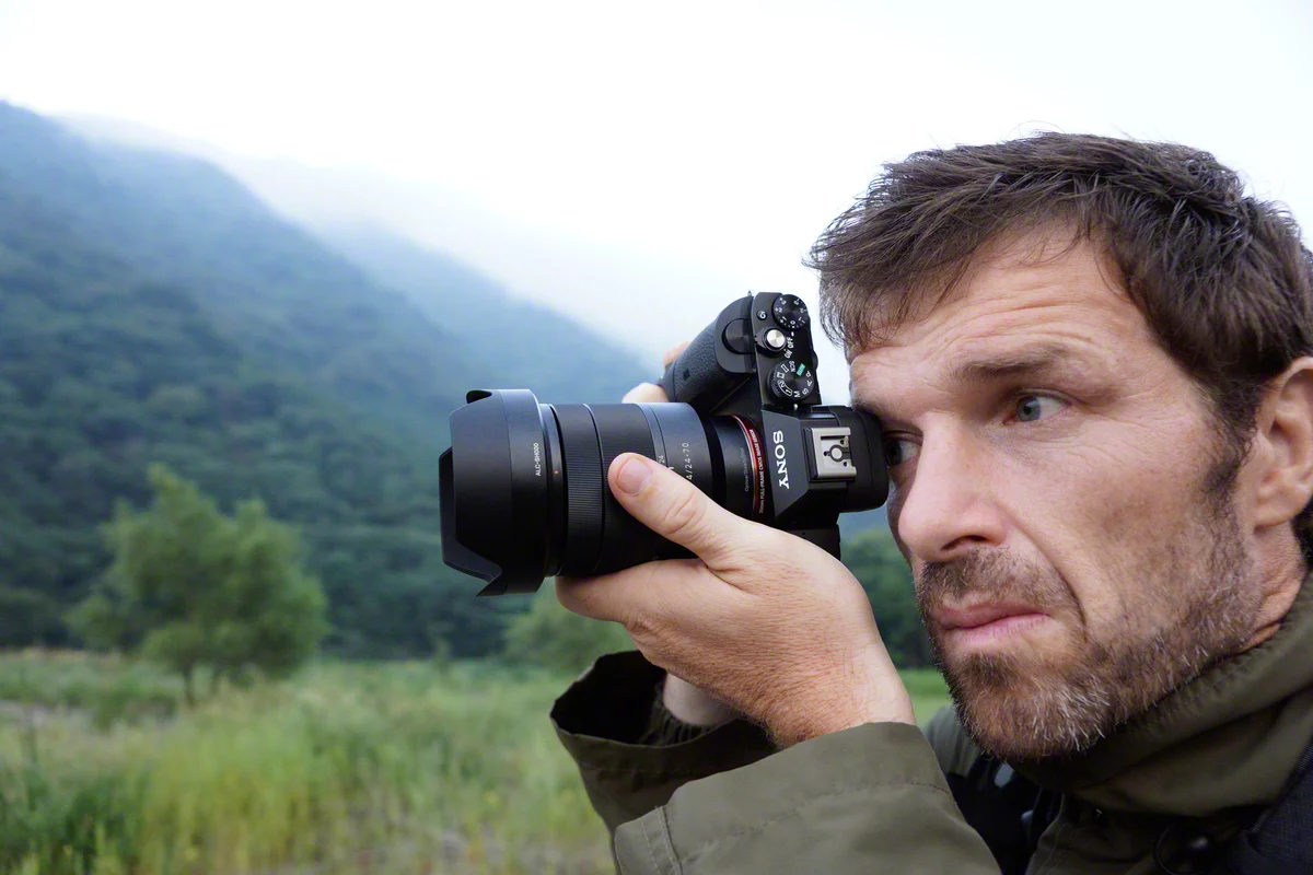 The α7R has ISO100 to 25600 sensitivity for stills or movies (though this can be expanded to 50 - 51200), and a top continuous shooting speed of 4 fps