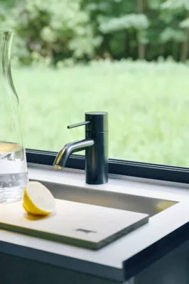 Gorgeous compact kitchen with sink and window outlook