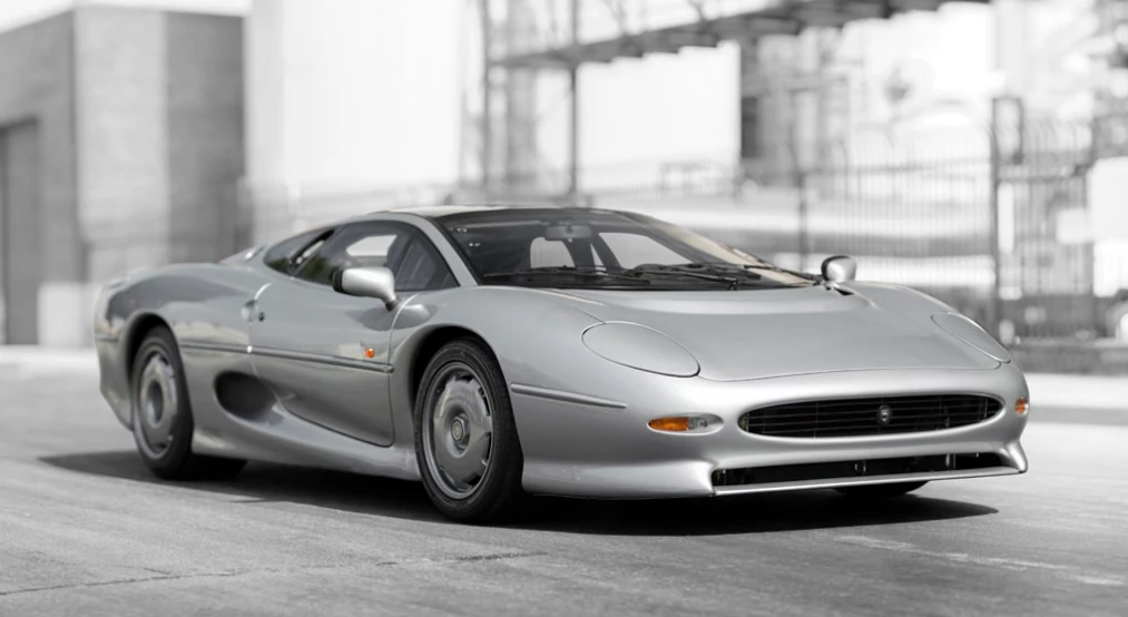 In 1988, the XJ220 concept was unveiled at the British International Motor Show with a V12 engine sending power to all four wheels, like the Porsche 959. Based on the overwhelmingly positive response it received, Jaguar started accepting pre-orders with a deposit of just £50,000 (about US$96,000 at the time). In the end, around 1,500 people laid down their cash, and delivery was slated for 1992. The production XJ220 was fitted with a 542 hp twin-turbocharged V6 in lieu of the V12 and the 4WD system went the same way. The XJ220, as the name suggests, had been targeted at a 220 mph (354 km/h) top speed, though the best it achieved under clinical conditions was 217 mph (349 km/h) on the circular Nardo circuit in Italy. When the McLaren F1 ran 231 mph (372 km/h) in 1993, the Jaguar XJ220 quickly became old news, but aficionados are still getting a bargain basement investment, as the XJ220 was a fantastic car and held the Nürburgring Nordschleife production lap record until 2000 (7:46.36).