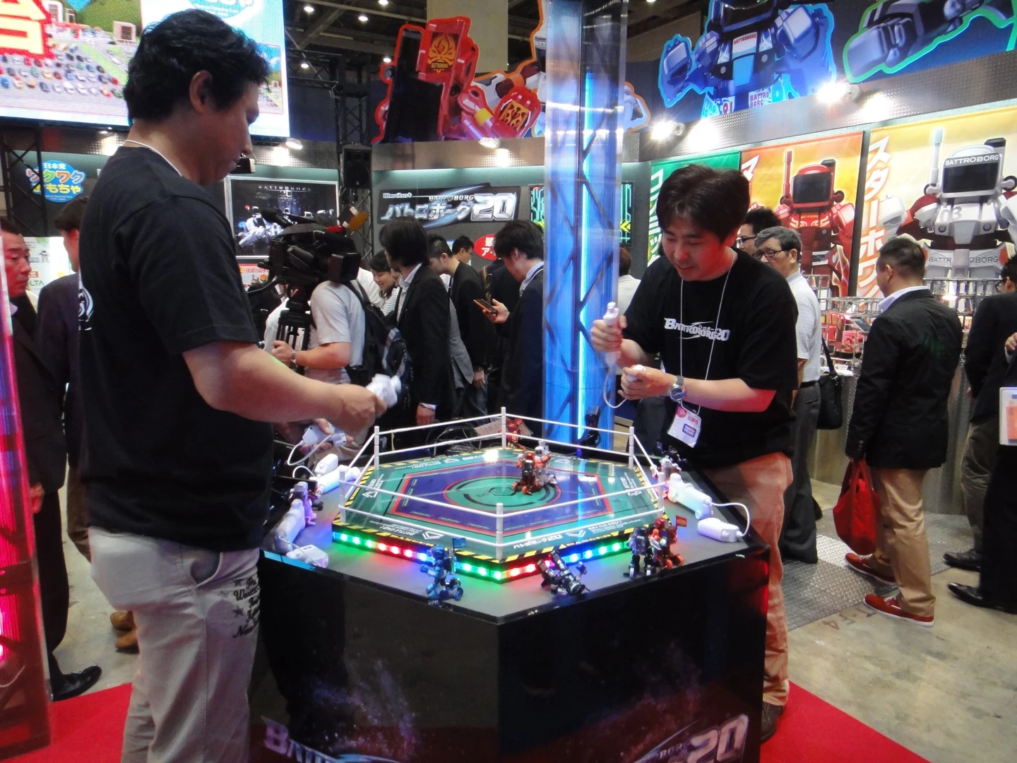 Tomy's new BattroBorg 20 system allows players to control fighting toy robots using Wii-like controllers