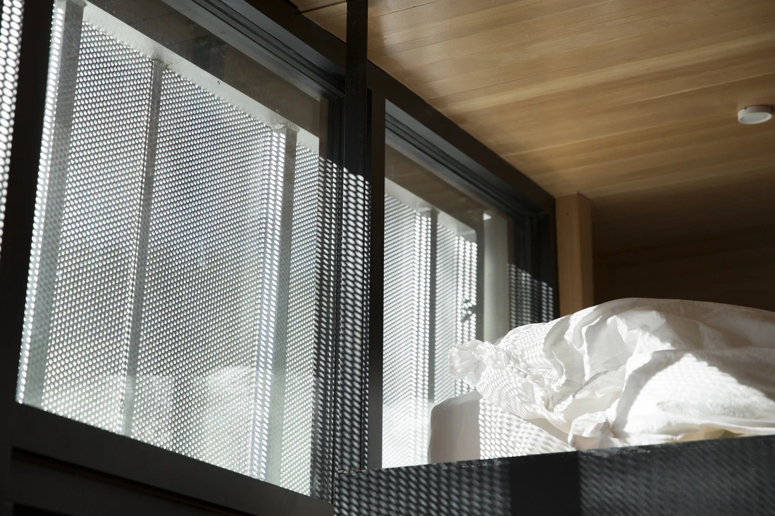 The tiny home sleeps three adults, or two adults and a child