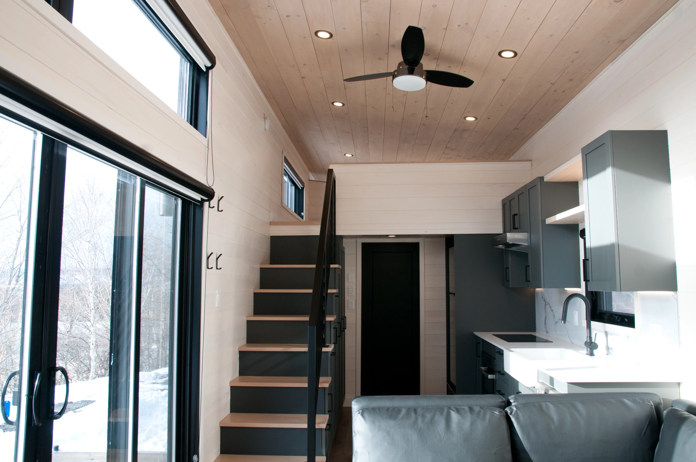 The Magnolia V7's living room receives lots of natural light thanks to its generous glazing, including the large sliding glass door