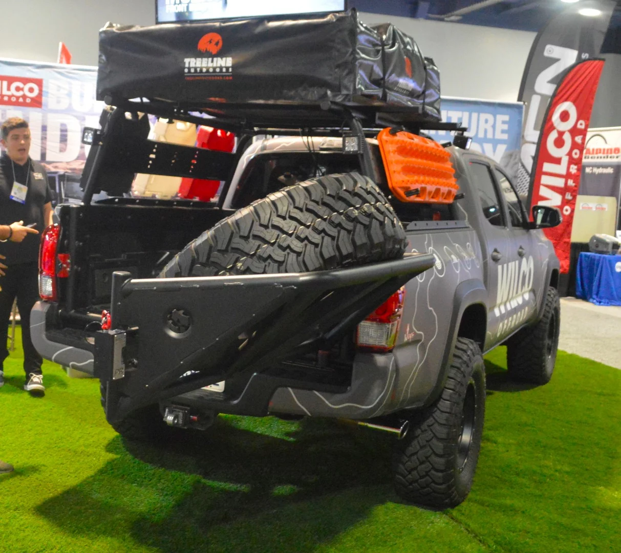 Wilco Offroad highlights its slick TireGate swing-out pickup spare tire holder. It offers a number of styles