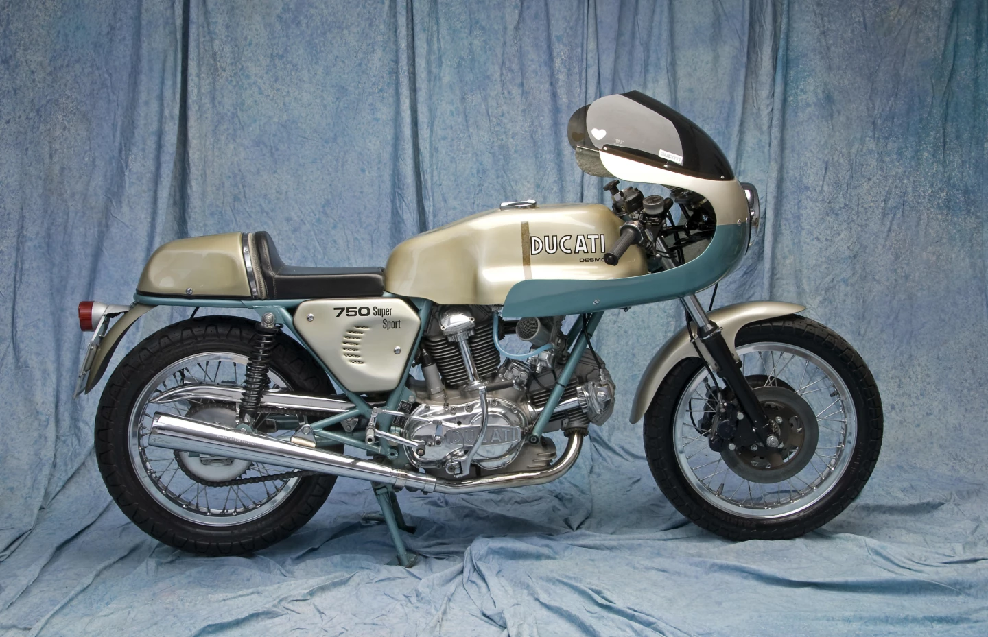 This original and un-restored 1975 Ducati 750SS was purchased new in September, 1975 by the vendor. The bike was never raced and the factory seals were still on the motor at the time of sale in May, 2008. It thus sold as a rare un-raced, one-owner, low-mileage example of Ducati’s most iconic ‘bevel drive’ model, fetching 117,000 at a Bonhams San Francisco sale in May, 2008.