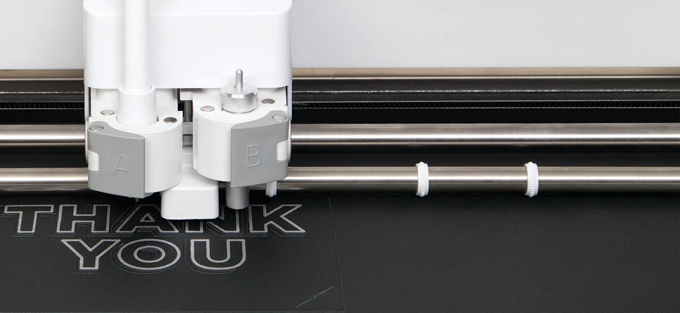 A close look at the joined cutting and marker heads