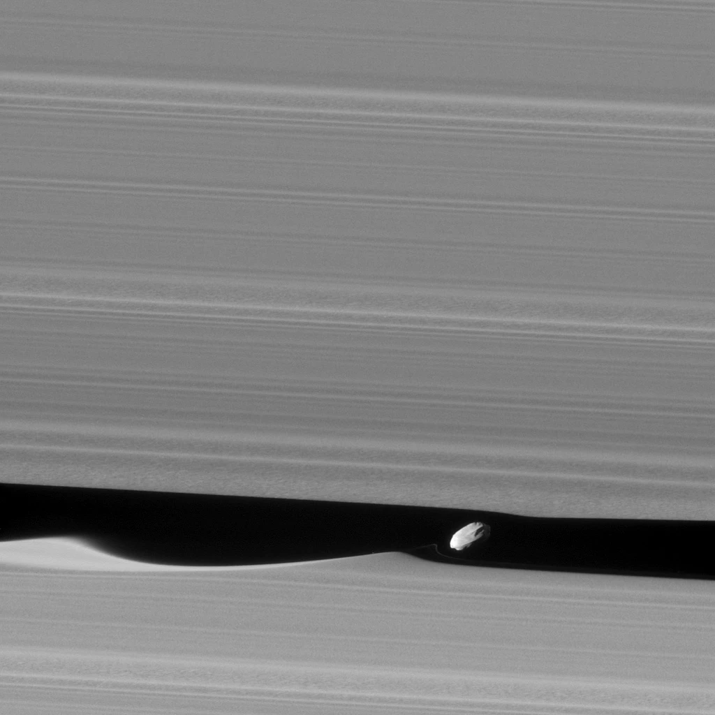 A closer look at Daphnis' effect on Saturn's rings