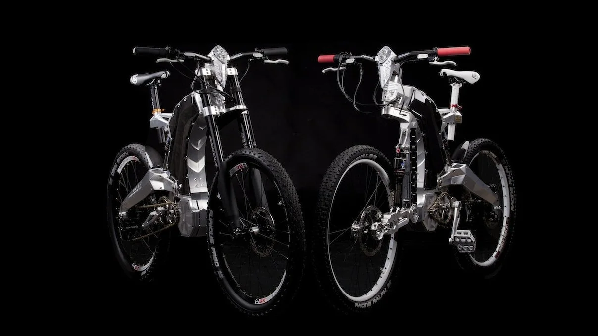 Budapest's M55 has announced the launch of the first two versions of its new Terminus luxury hybrid bike - one of which features a one-of-a-kind Biceps single-arm front suspension system