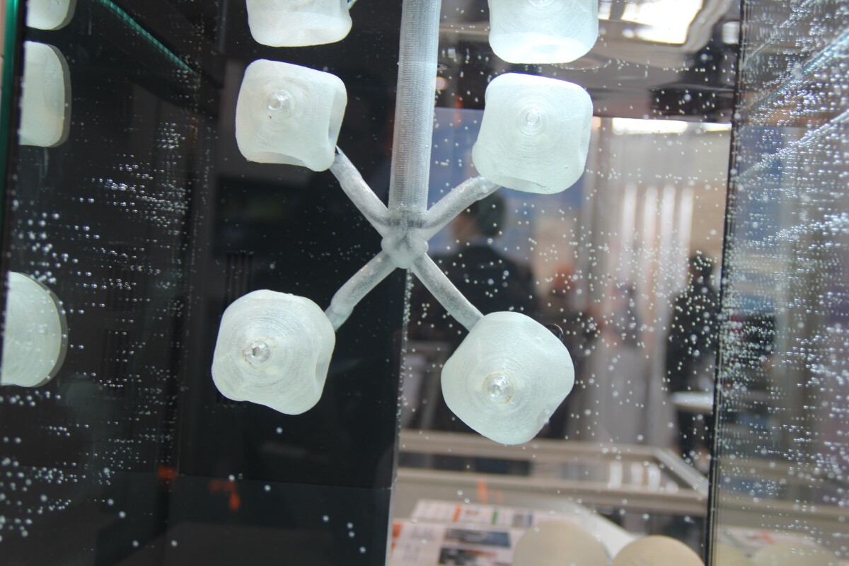The miniature prototype system consists of four joined 20 x 6-cm (7.9 x 2.4-in) elastomer balls, each with a hydraulic piston inside