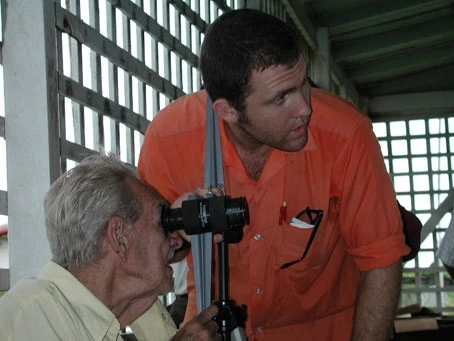 Saul administers an eyetest with his new invention.