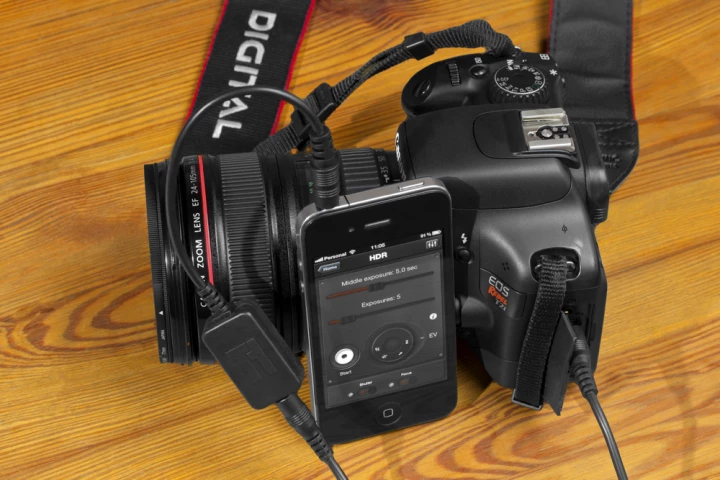 Triggertrap Mobile requires a dongle and cable to connect your iOS5 device to a DSLR