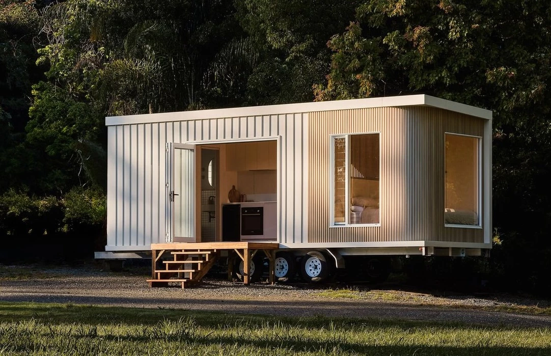 The Harper tiny house, by Black Clay, is a stylish towable home for up to two people that's defined by a modern curved exterior