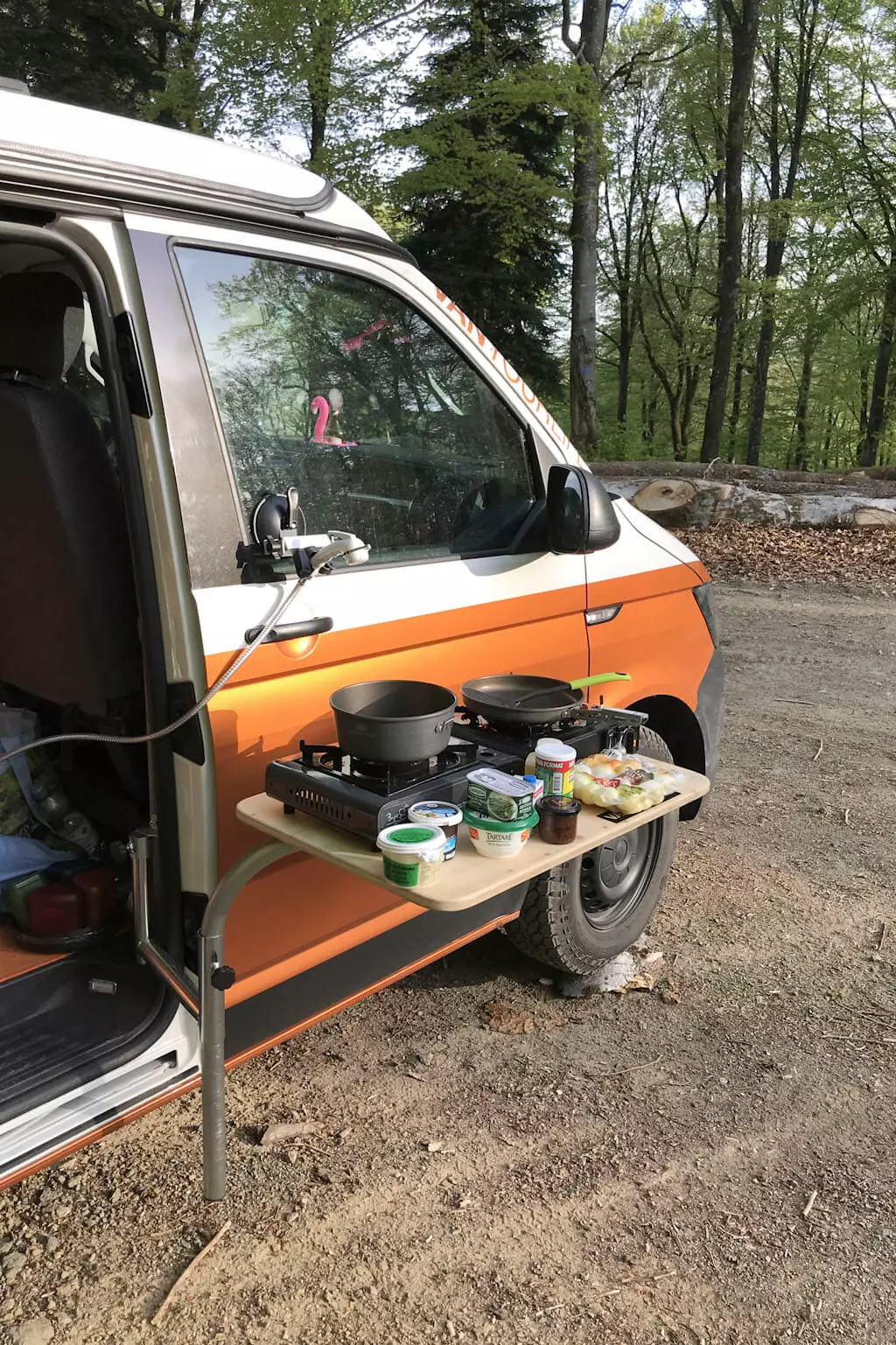 Cook outside atop the table and mount the sprayer above to create a functional outdoor kitchen