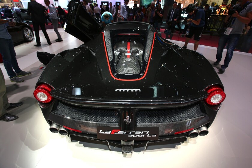 Ferrari offers the LaFerrari Aperta with carbon fiber and soft roof panels