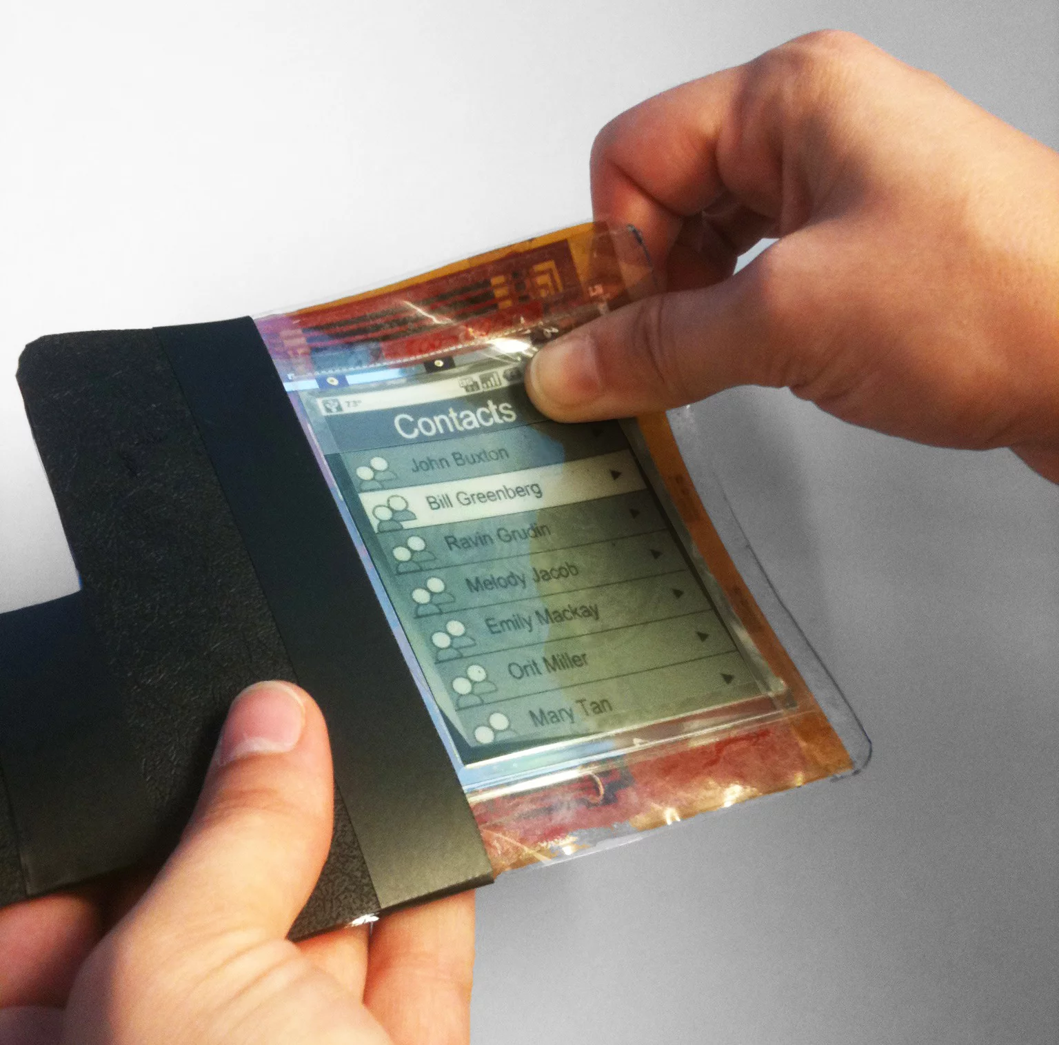 Researchers have created a thin film flexible smartphone, known as the Paperphone (Photos: Queen's University)