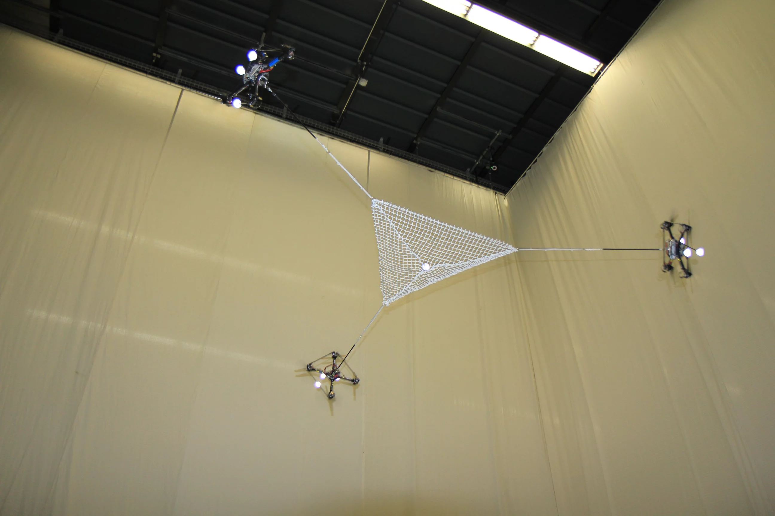 Flying quadrocopters at ETH Zurich's Flying Machine Arena play catch
