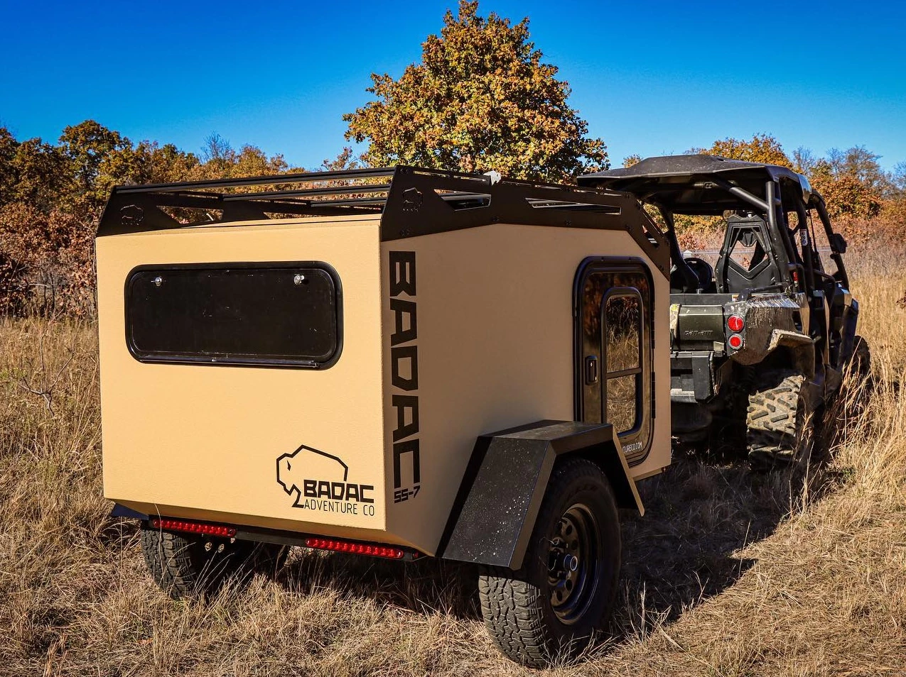 Badac keeps things as compact as possible by trading out the rear kitchen for a simple storage hatch that invites owners to bring their own cooking gear along