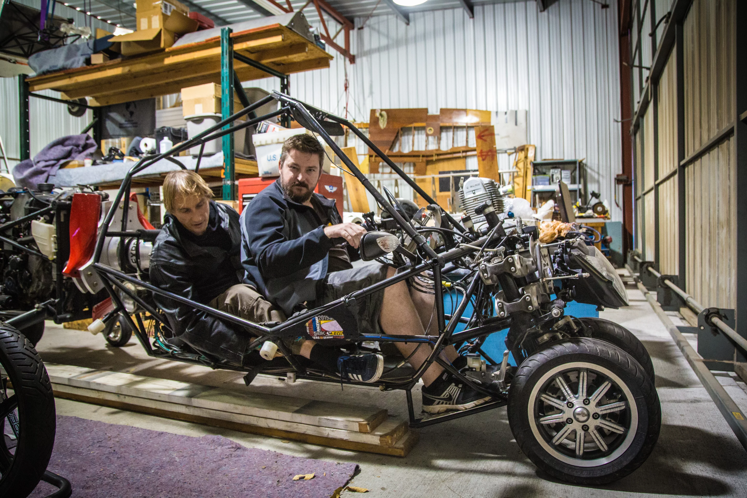 Loz Blain and Dezso in the two-seater G2 flying motorcycle (which isn't kitted out with its top rotor yet)