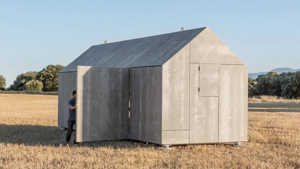 The outside of ÁPH80 is clad in grey cement lending the structure an appealingly minimalist appearance (Photo: ÁBATON)