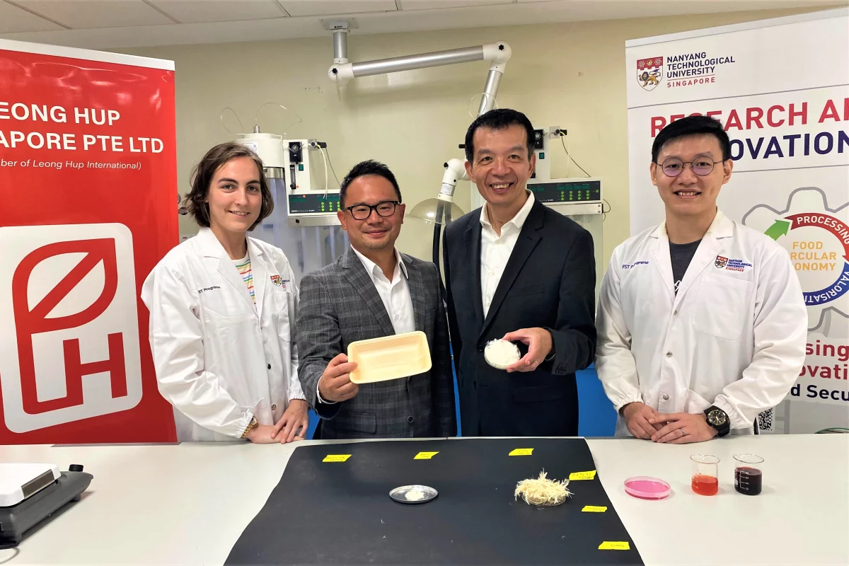 From left, team members Eleanor Soole, Lau Joo Hwa, William Chen and Teng Ting Shien – Hwa holds a tray made from chicken feather protein, while Chen displays a dish of the pulverized feathers