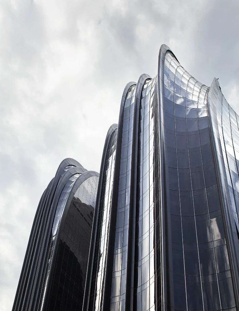 The Chaoyang Park Plaza's twin towers rise to a maximum height of 142 m (465 ft)-tall
