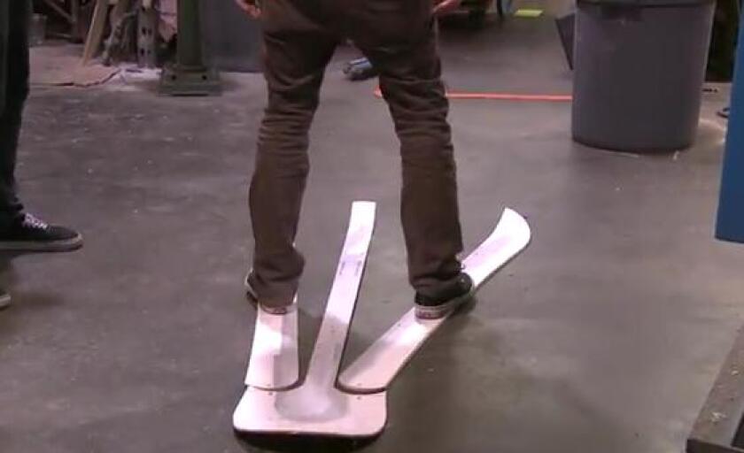 Two short skis and a shovel