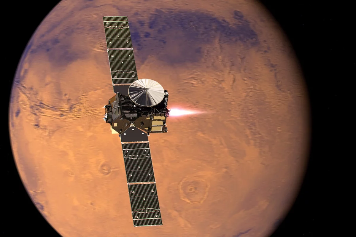Artist's impression of the ExoMars 2016 Trace Gas Orbiter, with its thrusters firing, beginning its entry into Mars orbit on 19 October 2016
