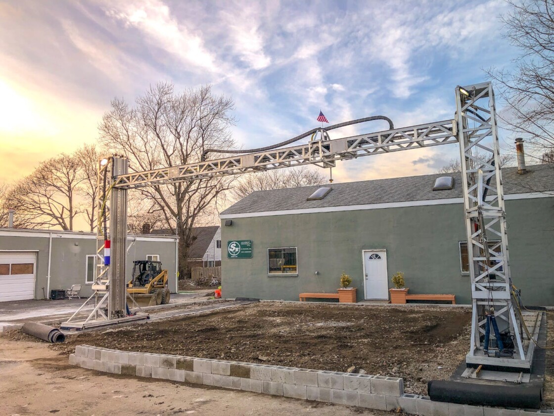 SQ3D's 3D printer extruded a cement mixture in layers to build up a structure