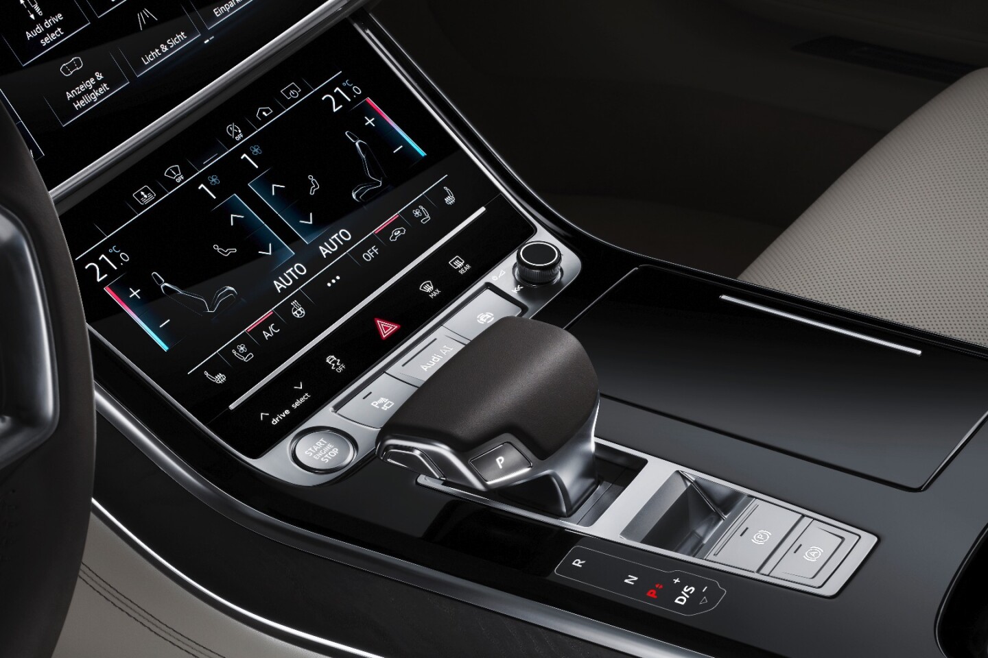 The dual touchscreen console control center handles climate control and other functions on its lower screen