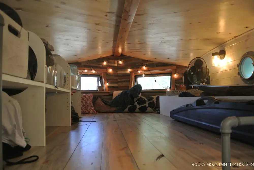 The San Juan Tiny House has a secondary loft that's used as storage space and a second bedroom