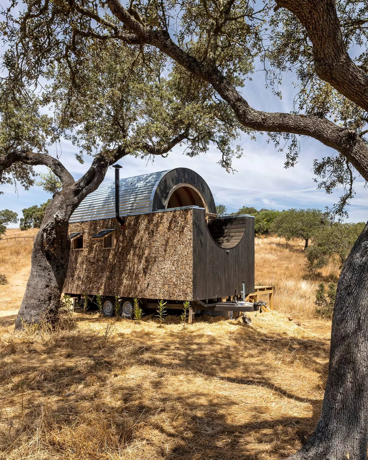 The Terra m1_Tiny House on Wheels is based on a double-axle trailer and measures just 5 m (16.4 ft) in length