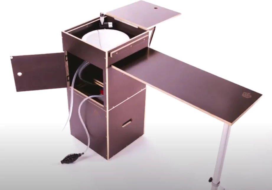 The top of the sink box becomes a worktop, and a sleeping platform panel becomes the table