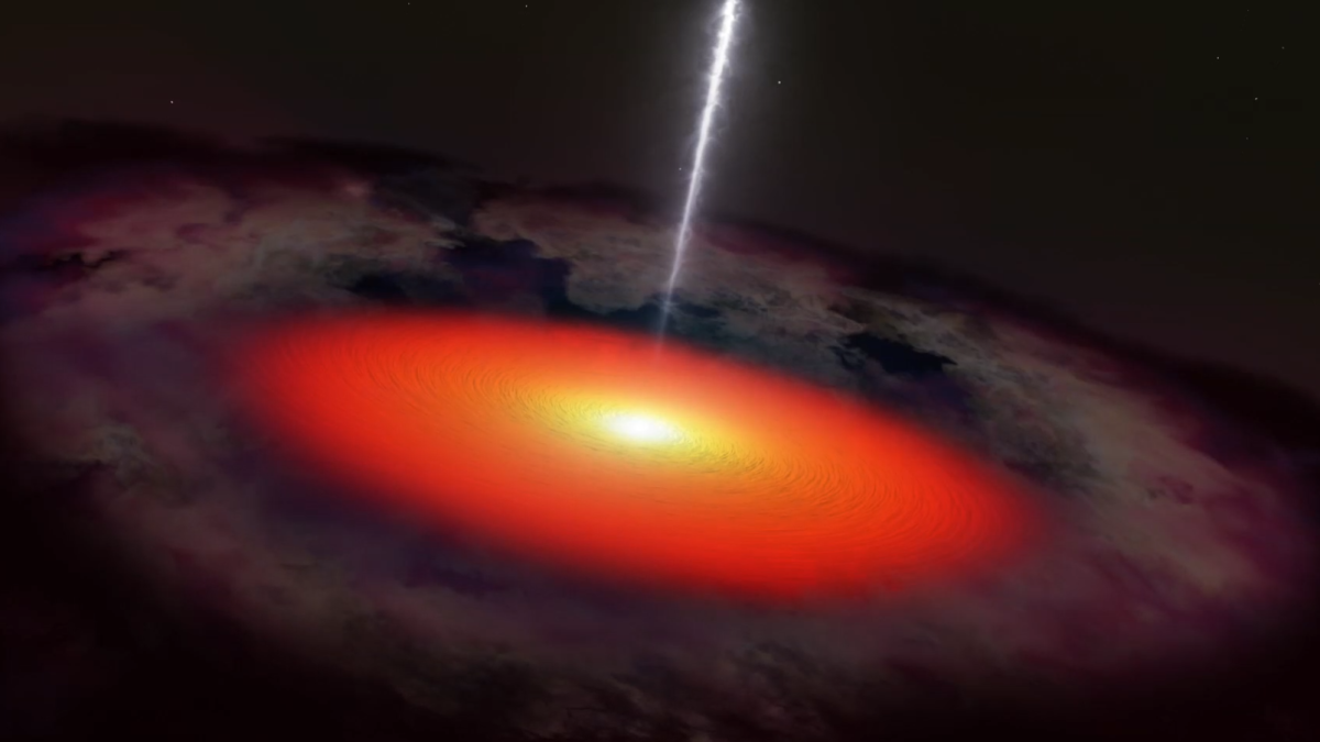 A blazar is an active galaxy with a supermassive black hole at its center, which is throwing two jets of high-energy particles out from its core – and it appears so bright because one of those jets is pointed straight at Earth