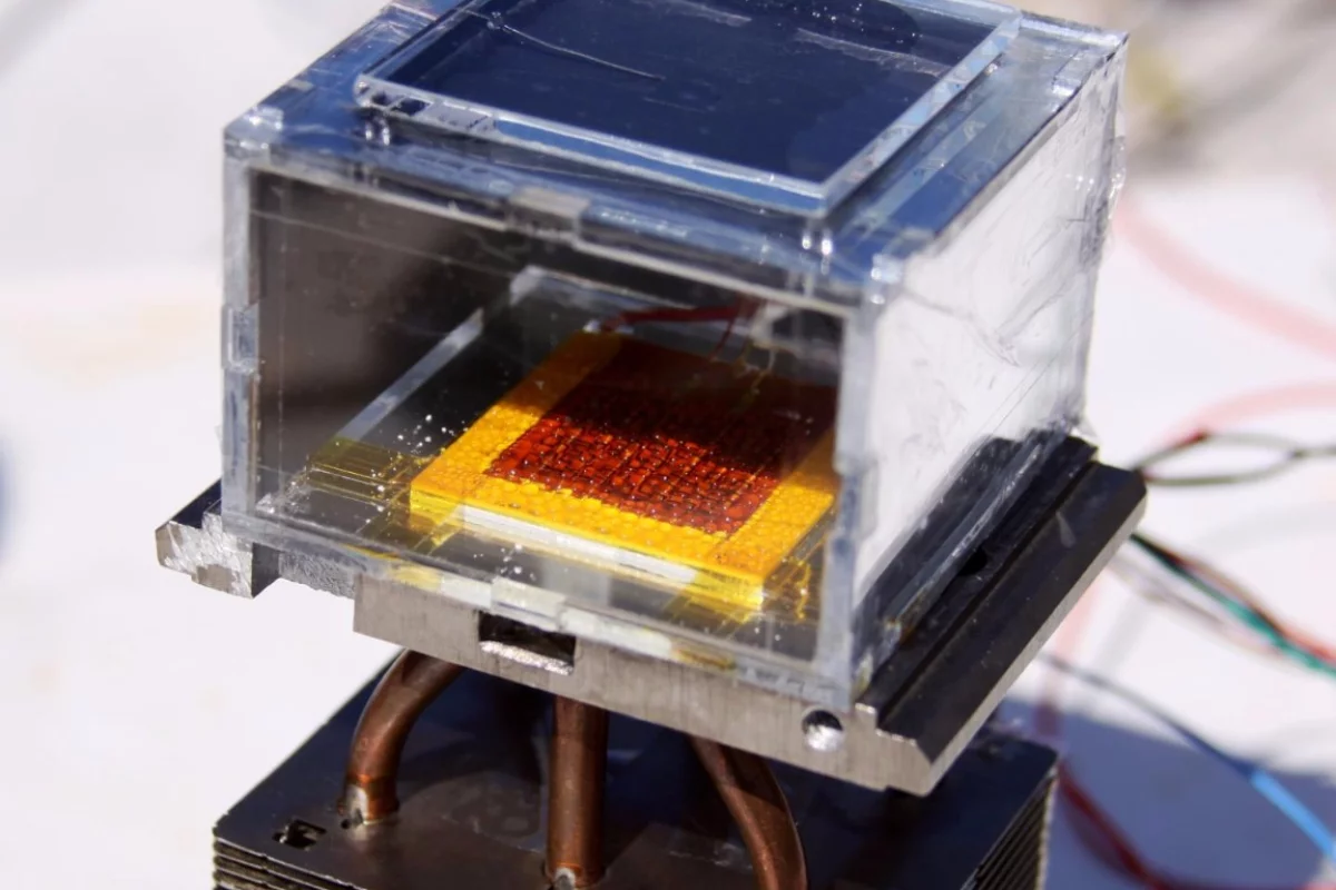 The key component of the solar-powered water harvester is the metal organic framework (in red) that is able to capture water molecules even in low humidity conditions