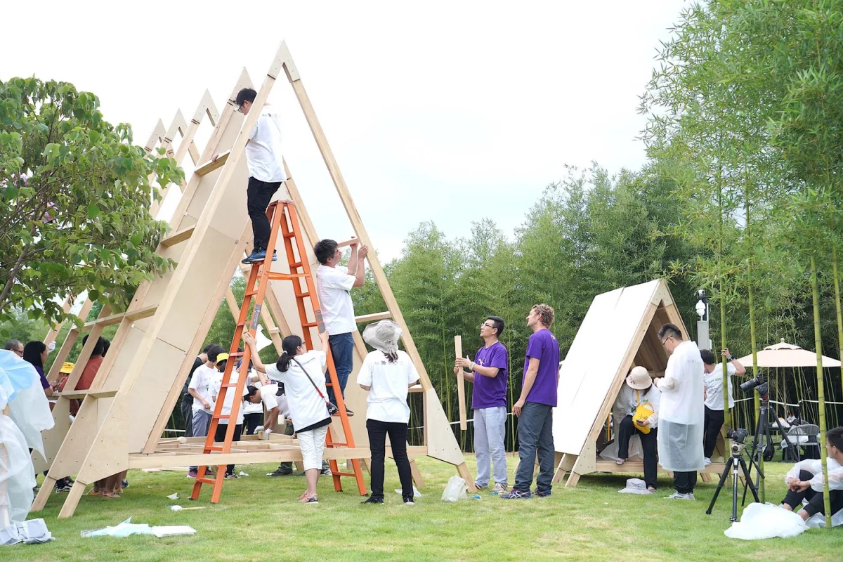 A group of children and families hand-built these tiny dwellings in just five hours