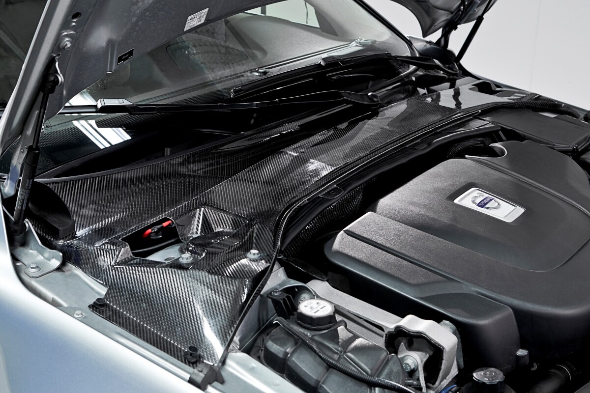 Capacitor infused carbon fiber crossmember in place on Volvo S80 test vehicle